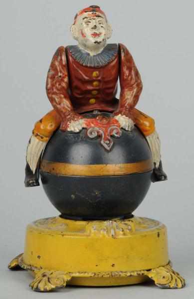 Appraisal: Cast Iron Clown on Globe Mechanical Bank Description Manufactured by