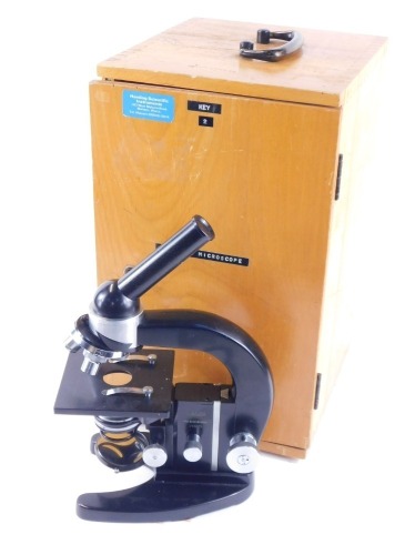 Appraisal: A Meopta cased microscope with additional caps and lenses the