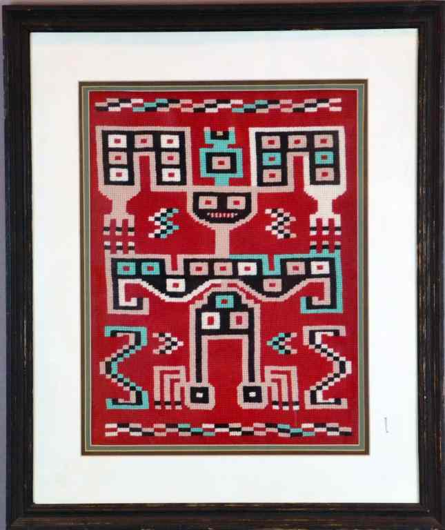 Appraisal: Native American NeedlepointDepicting an abstract design in reds greens and