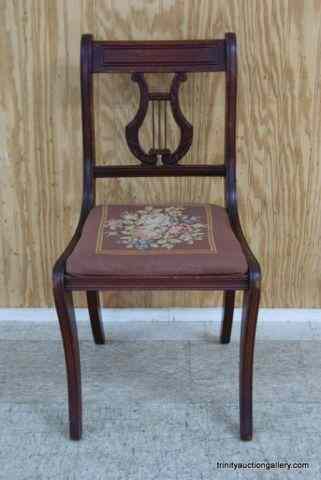 Appraisal: Vintage Mahogany Lyre Back Needle Point ChairThis is a nice