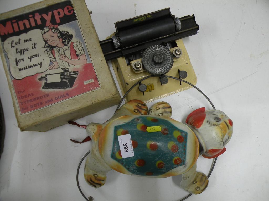 Appraisal: A Mobo walking puppy and a mini type childrens' typewriter