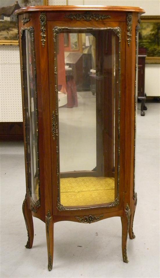 Appraisal: French style fruitwood and glass curio cabinet on four legs