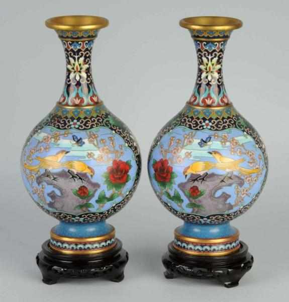 Appraisal: Pair of Cloisonne Oriental Vases Description Mirror images of birds