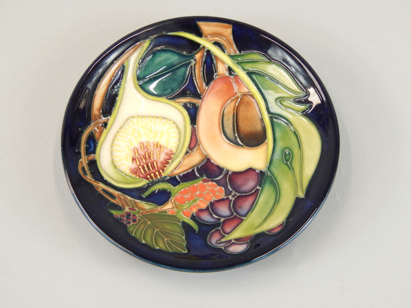 Appraisal: A modern Moorcroft pottery dish decorated with a design of