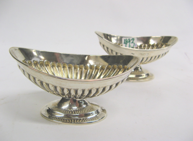 Appraisal: PAIR LONDON ENGLAND STERLING SALT CELLARS hallmarked on the side