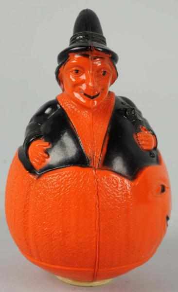 Appraisal: Celluloid Halloween Witch in Pumpkin Condition Excellent Size - T