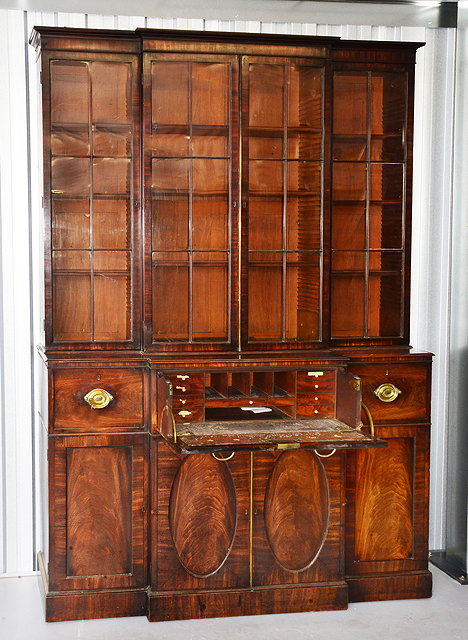 Appraisal: A GEORGE III MAHOGANY BREAK FRONT BOOKCASE of small proportions