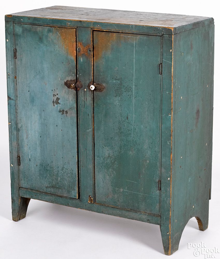 Appraisal: New England diminutive painted butternut cupboard New England diminutive painted