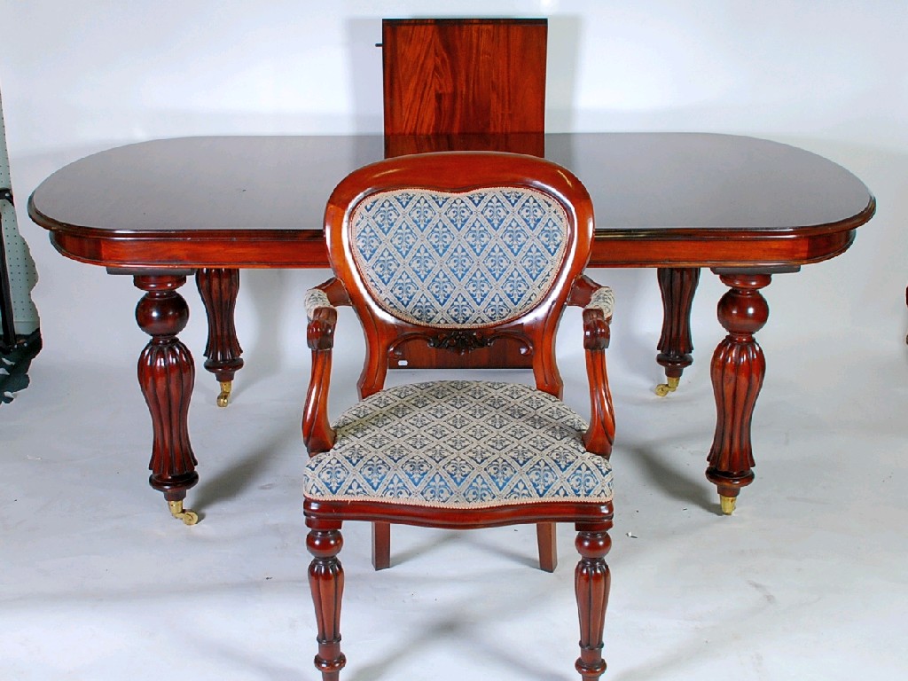 Appraisal: VICTORIAN STYLE MAHOGANY WIND OUT EXTENDING DINING TABLE AND SET