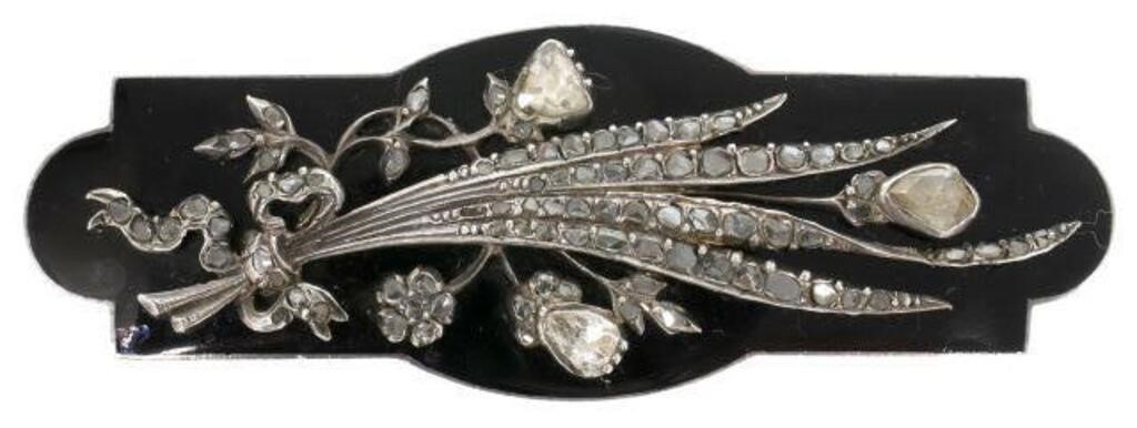 Appraisal: Estate silver tested-content unknown brooch black plaque bouquet of flowers