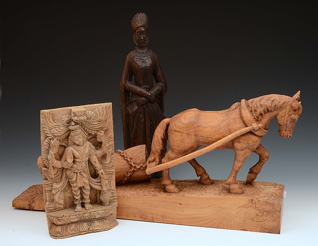 Appraisal: A carved oak figuresigned to the base L Coussaint cm