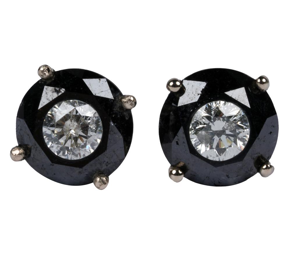 Appraisal: PAIR OF KARAT YELLOW GOLD DIAMOND STUDScontaining two carved round