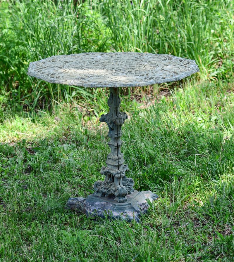 Appraisal: VICTORIAN PAINTED CAST IRON GARDEN TABLE With a pierced circular