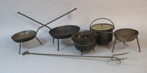 Appraisal: Wrought iron hearth equipment to include three footed warming pans