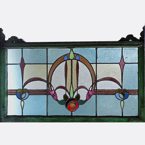 Appraisal: ARTS CRAFTS Leaded glass window with a swag and medallion