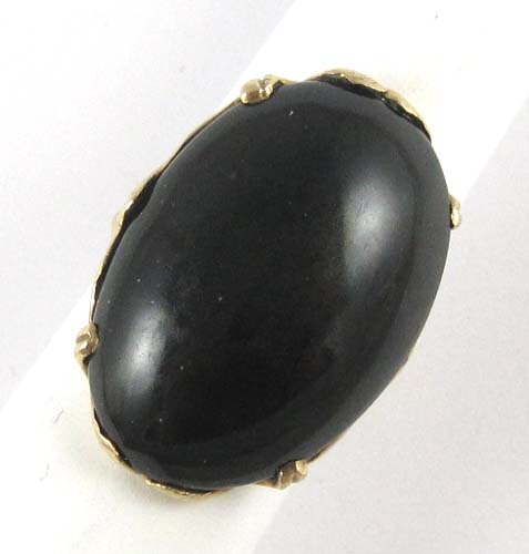 Appraisal: BLACK JADE AND TEN KARAT GOLD RING yellow gold pongs