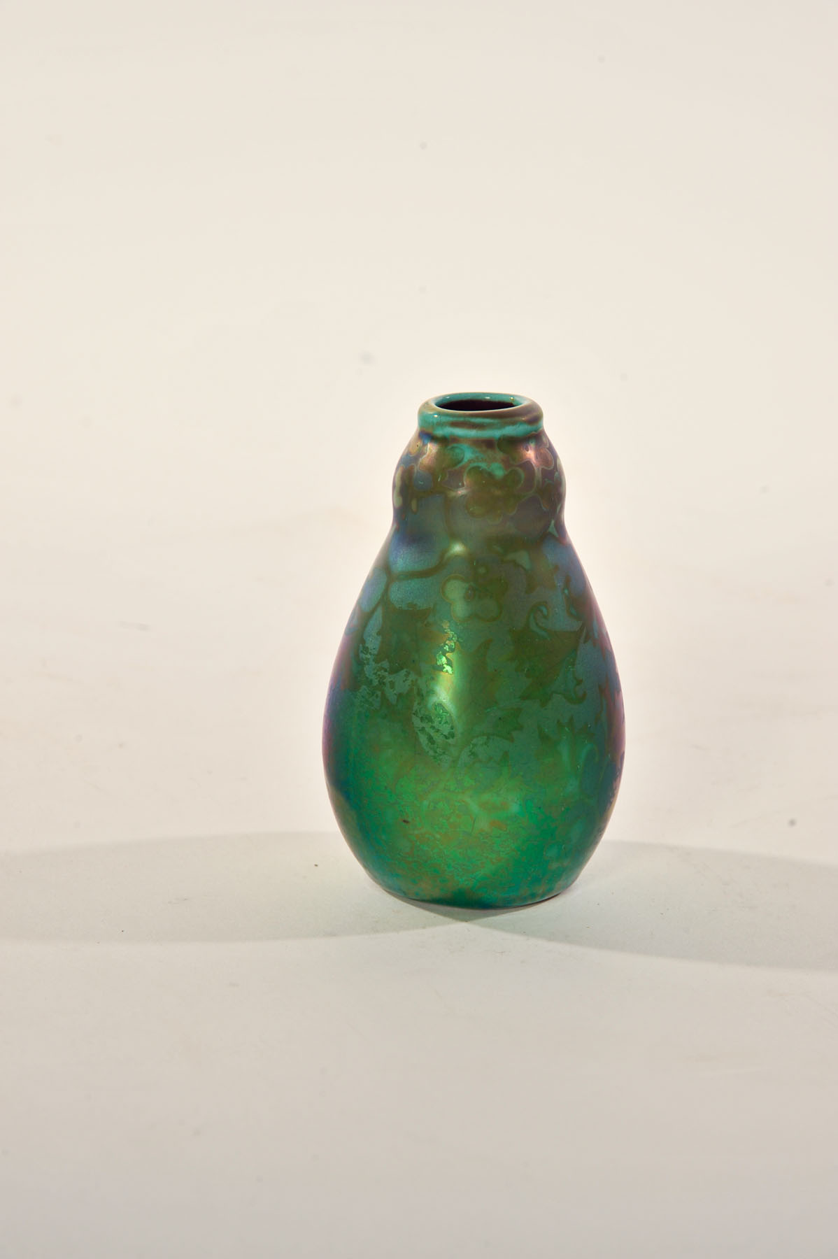 Appraisal: SICARD WELLER VASE Ohio early th century Green iridescent vase