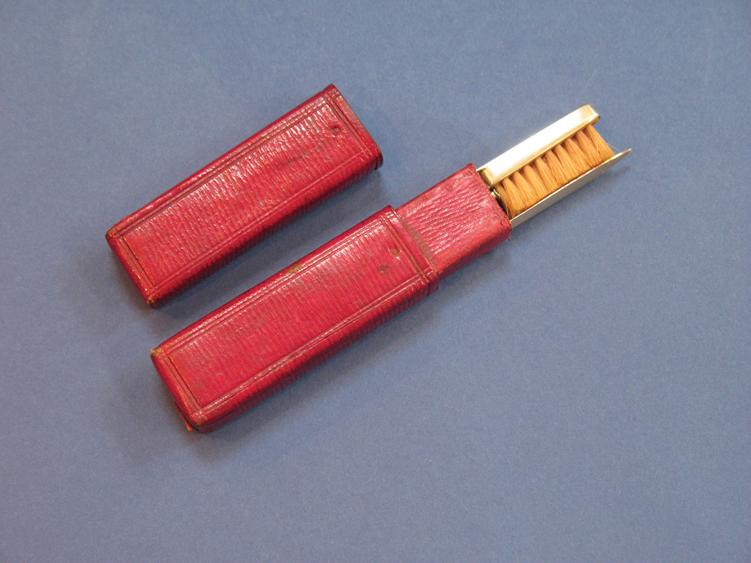 Appraisal: A GEORGE III TONGUE SCRAPER tooth brush and powder box