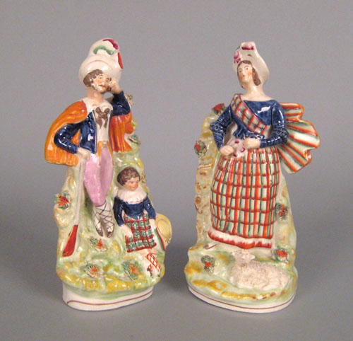 Appraisal: Pair of Staffordshire figures of a Scotsman and wife th