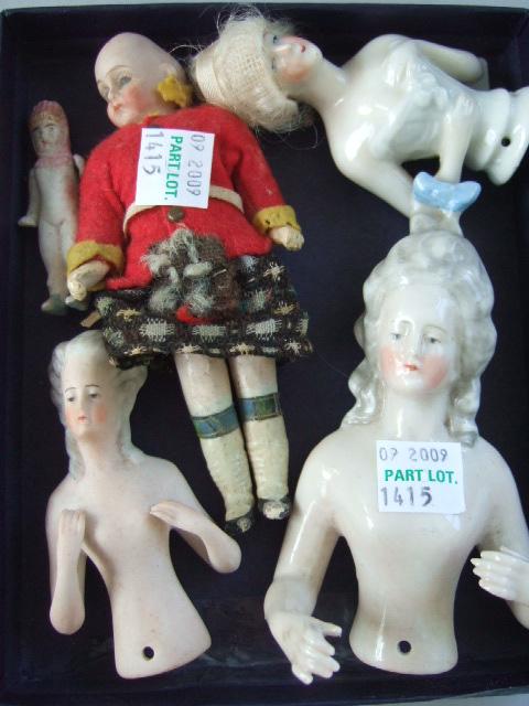 Appraisal: A miniature German bisque head doll in a Highland outfit