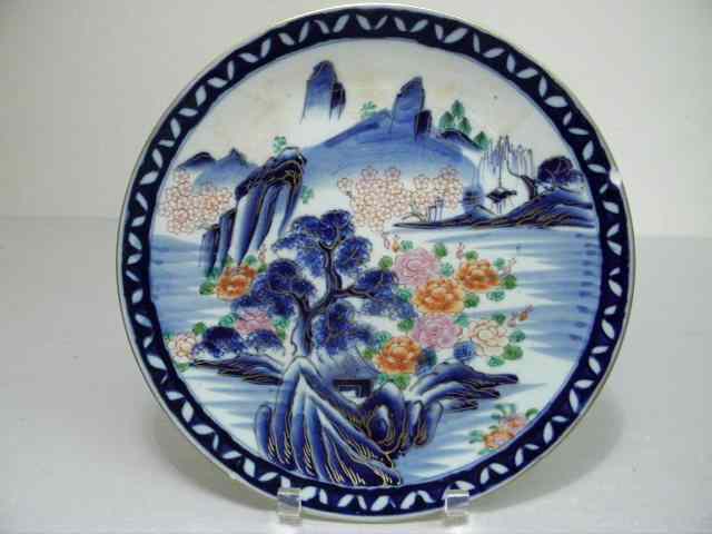 Appraisal: Imari round hand painted charger Colorful landscape floral scene with