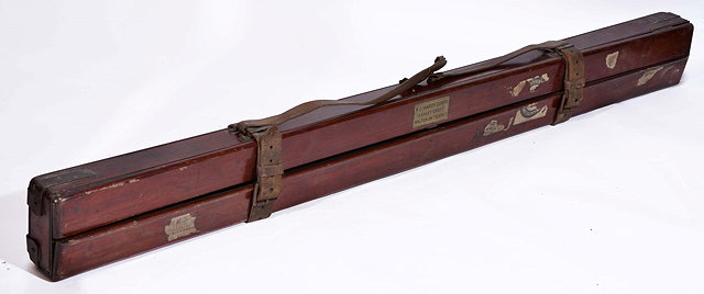 Appraisal: A VICTORIAN MAHOGANY FISHING ROD CASE with leather straps and