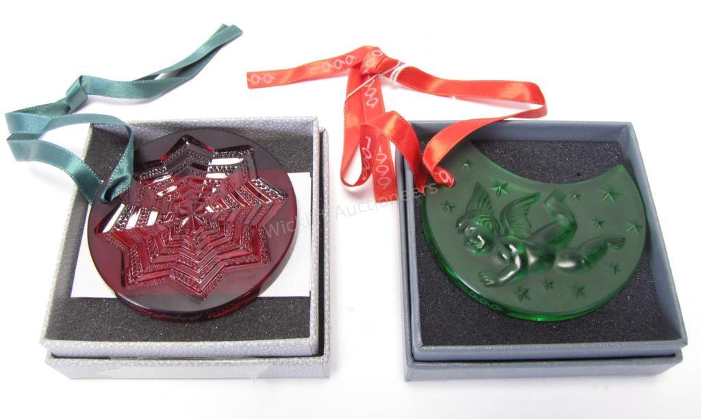 Appraisal: Two Lalique crystal ornaments including a round ruby crystal ornament