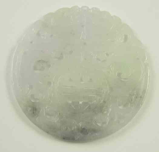 Appraisal: CARVED CHINESE JADE PENDANT round tablet carved on both front