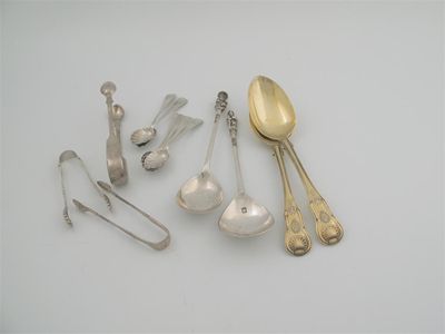 Appraisal: Miscellaneous flatware two late Victorian silvergilt tablespoons Hourglass pattern engraved