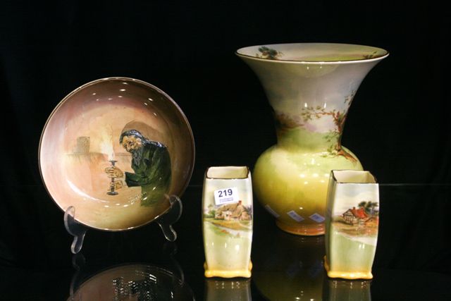 Appraisal: A Royal Doulton set of three vases with handpainted cottage