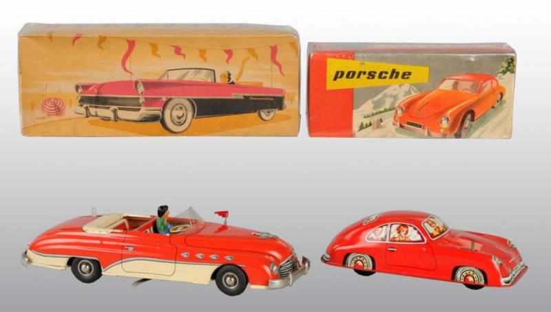 Appraisal: Lot of Tin Automobile Toys Description French Includes one wind-up