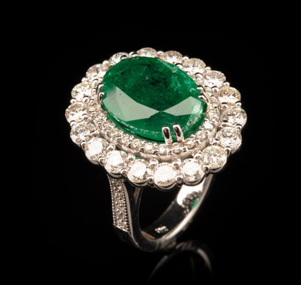 Appraisal: kt White Gold Emerald and Diamond Ring center oval mixed-cut