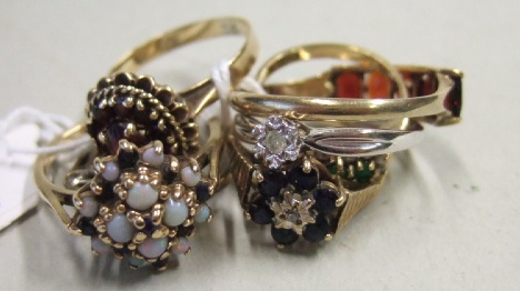 Appraisal: A ct gold opal and sapphire set cluster ring a