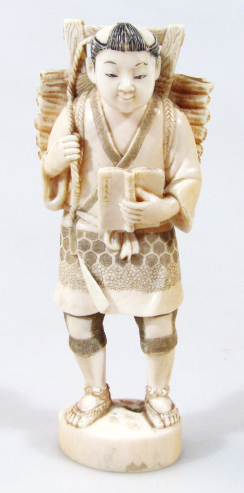 Appraisal: An early thC Japanese okimono figure of a gentleman holding