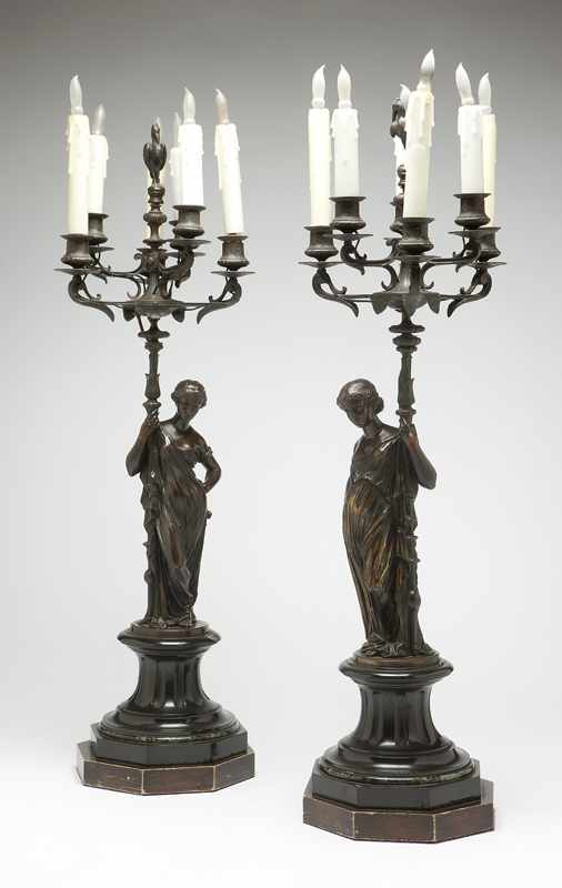 Appraisal: A pair of Continental bronze -light figural candelabra signed Boitel