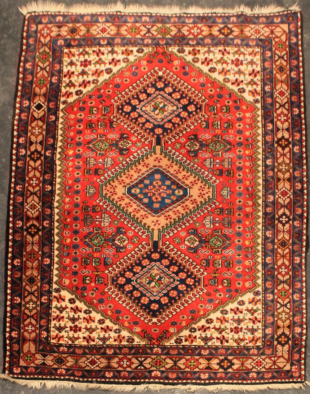 Appraisal: THREE PERSIAN RUGS INCLUDING TWO SHIRAZ the first a three