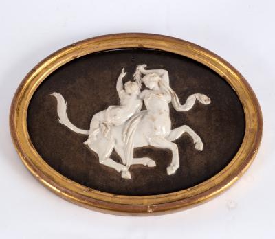 Appraisal: An oval porcelain plaque depicting Nessus and Deianira in relief