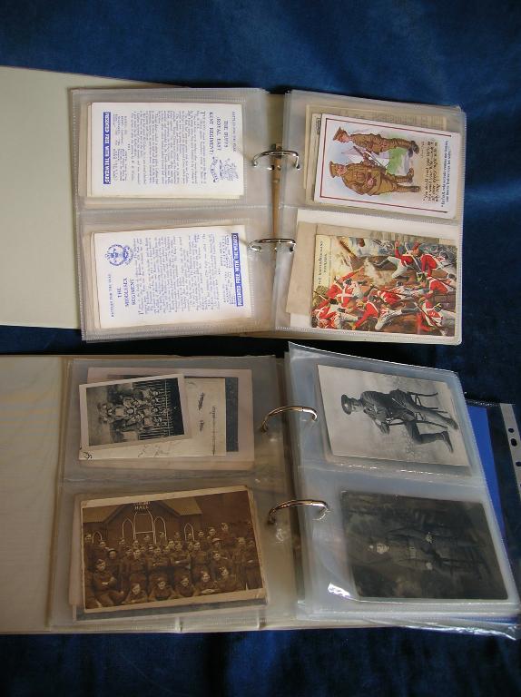 Appraisal: A collection of postcards of military subjects contained in two