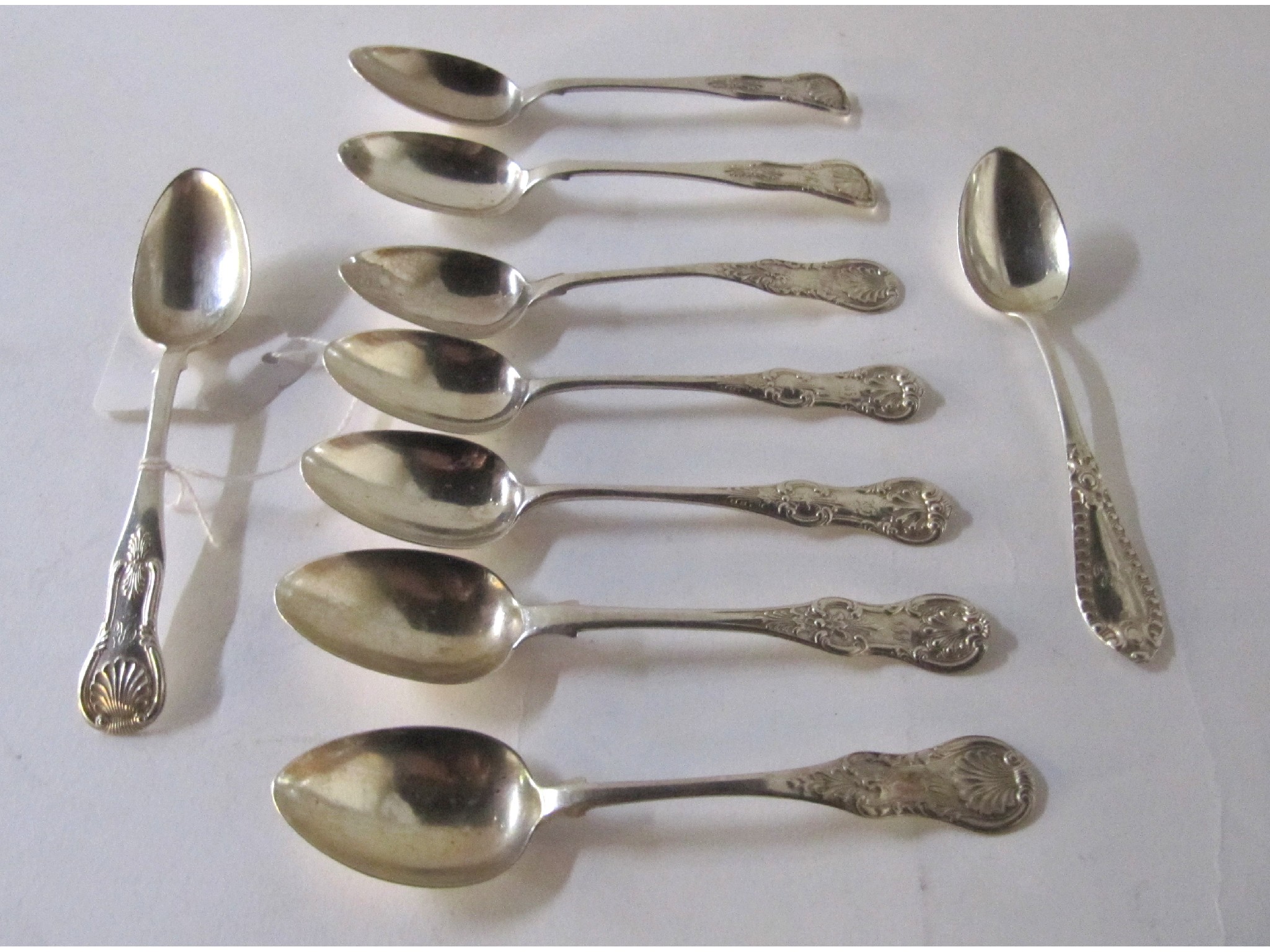 Appraisal: A lot comprising eight silver teaspoons Edinburgh and a single