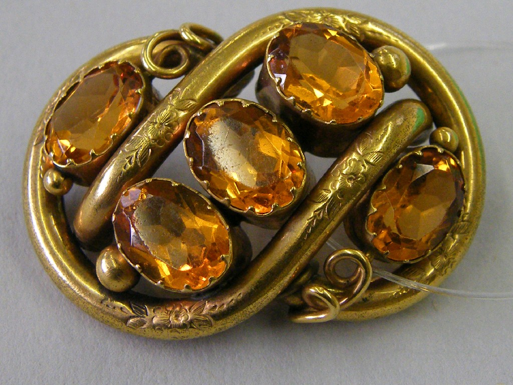 Appraisal: Victorian stone set oval brooch in an engraved oval knot