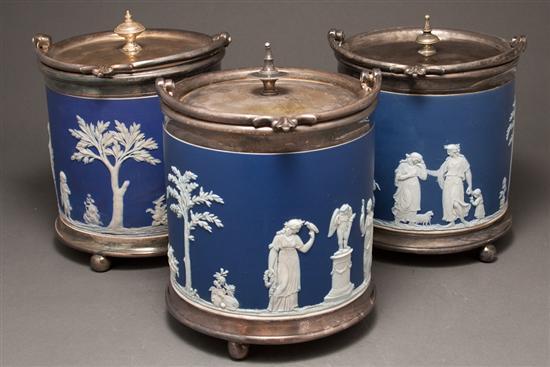 Appraisal: Three Wedgwood blue and white jasperware biscuit jars late th