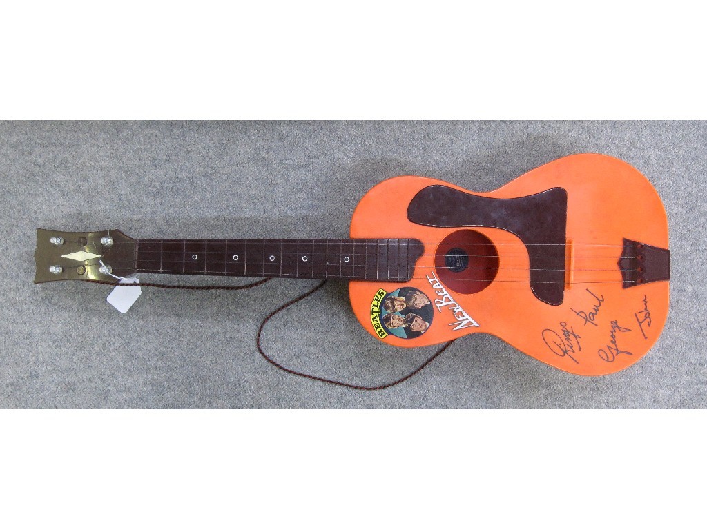 Appraisal: Beatles 'New Beat' guitar in orange and burgandy with group