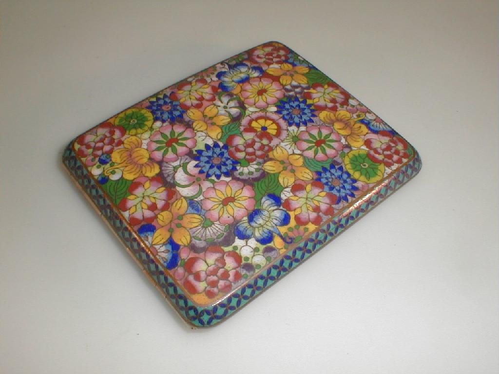 Appraisal: A cloisonn cigarette case with floral decoration