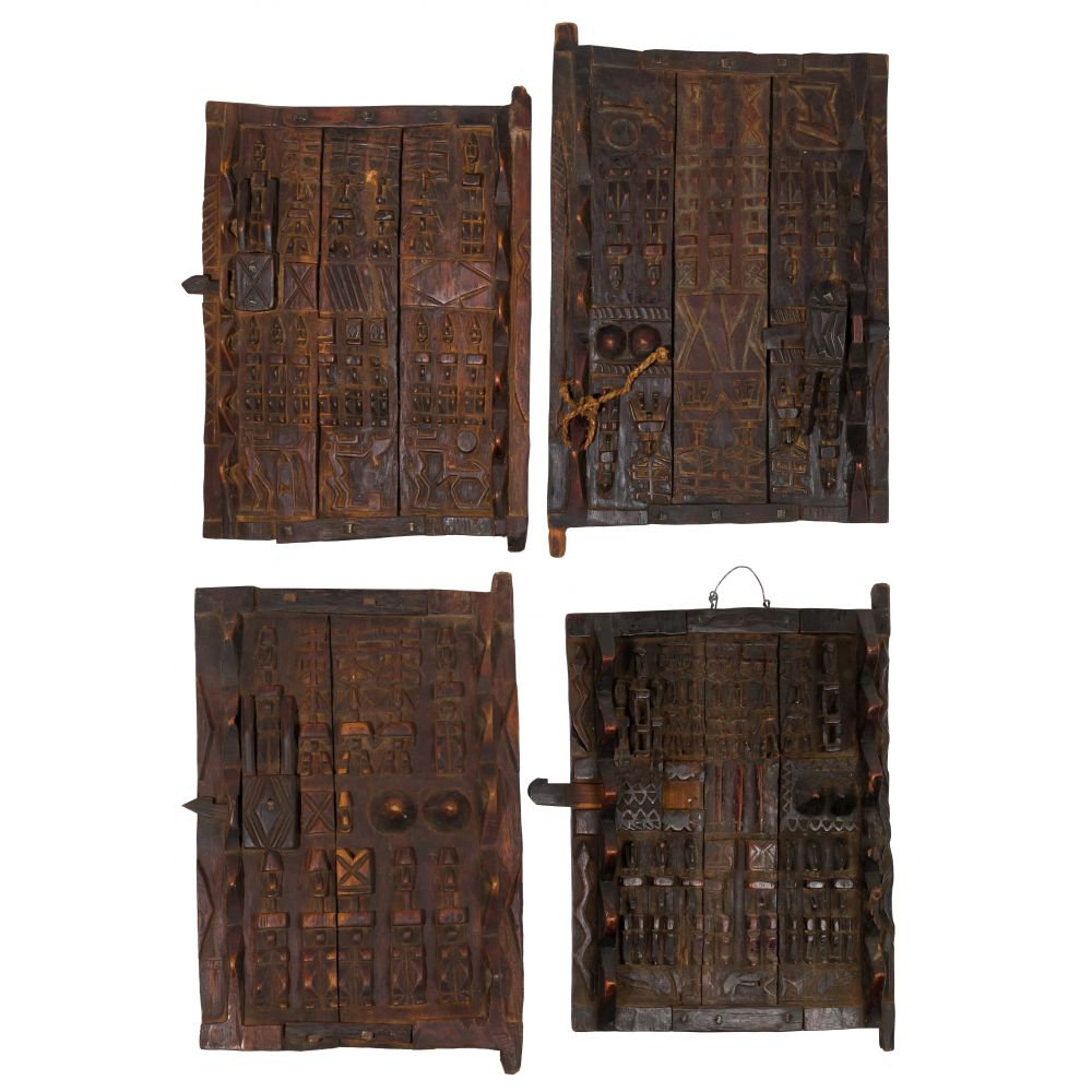 Appraisal: AFRICAN DOGON GRAINERY DOOR ASSORTMENT carved panel doors with some