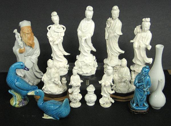 Appraisal: A group of fifteen white glazed and blue glazed porcelain