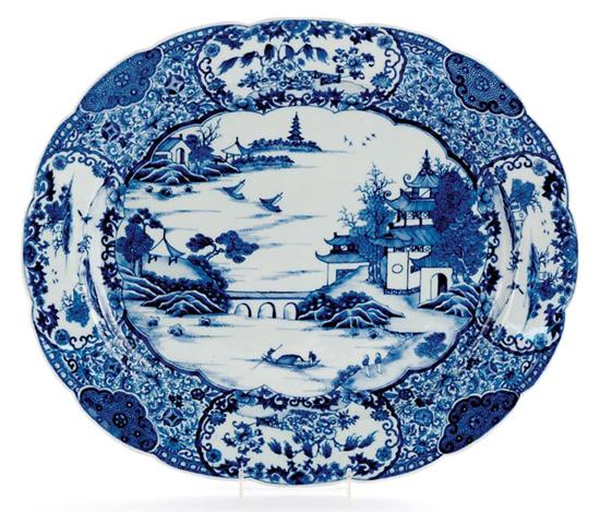 Appraisal: English blue-and-white porcelain platter late th century scalloped oval platter