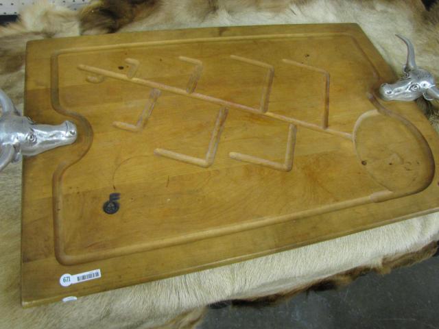 Appraisal: Large meat carving board with steer head aluminum handles branded