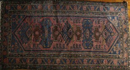 Appraisal: Persian Grape Ground Long Rug ft in x ft in