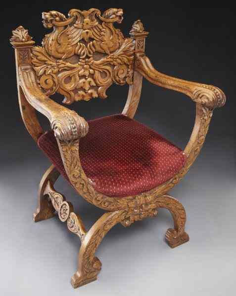 Appraisal: Continental oak savonarola throne chair of typicalform the backrest highly