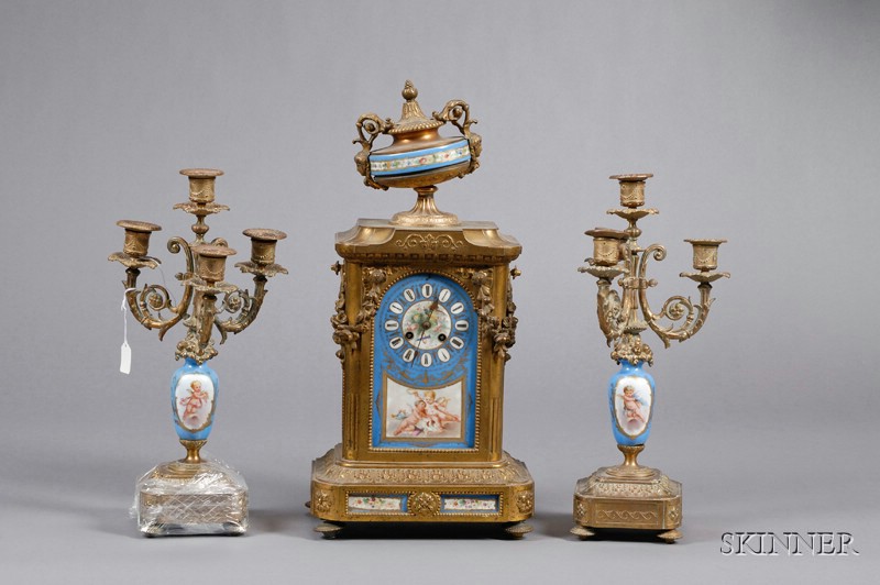 Appraisal: Louis XVI Style Porcelain-mounted and Ormolu Three-Piece Clock Garniture late